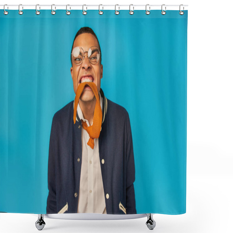 Personality  African American Student In Stylish Jacket And Eyeglasses Having Fun And Biting Tie On Blue Shower Curtains