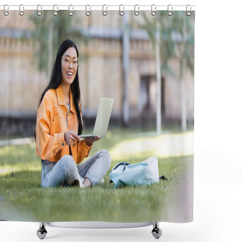 Personality  Happy Asian Woman Sitting On Grass With Laptop And Smiling At Camera Shower Curtains