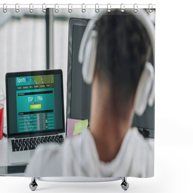 Personality  KYIV, UKRAINE - JULY 29, 2019: Back View Of African American Programmer In Headphones Sitting Near Laptop With Sportsbet Website On Screen Shower Curtains