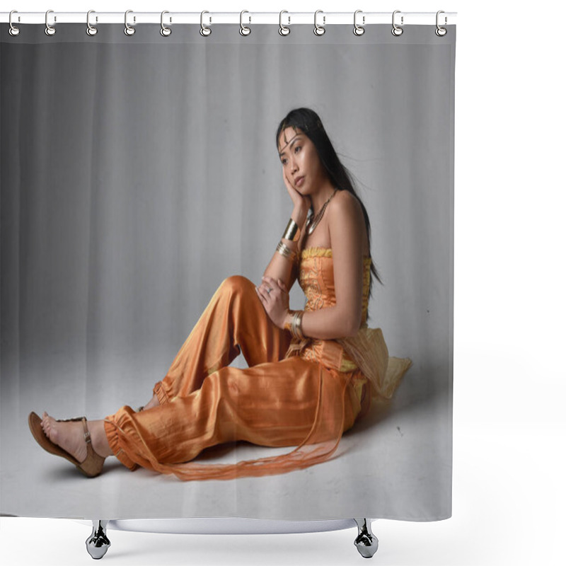 Personality  Full Length Portrait Of Pretty Young Asian Woman Wearing Golden Arabian Robes Like A Genie, Seated Pose, Isolated On Studio Background. Shower Curtains