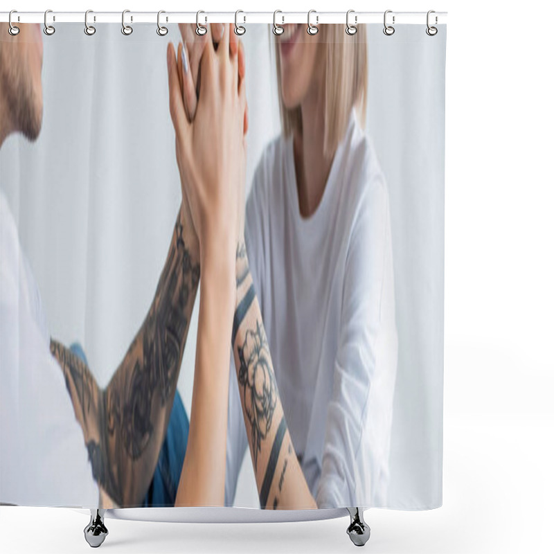 Personality  Cropped View Of Smiling Young Tattooed Woman Sitting With Husband On Floor And Holding Hands Isolated On Grey, Panoramic Shot Shower Curtains