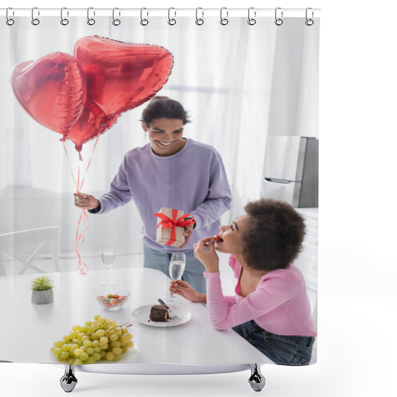 Personality  Smiling African American Man Holding Heart-shaped Balloons And Gift Near Girlfriend With Strawberry And Champagne At Home  Shower Curtains