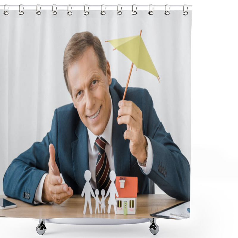 Personality  Businessman Holding Umbrella With Paper Cut Family And House Model On Wooden Table Shower Curtains