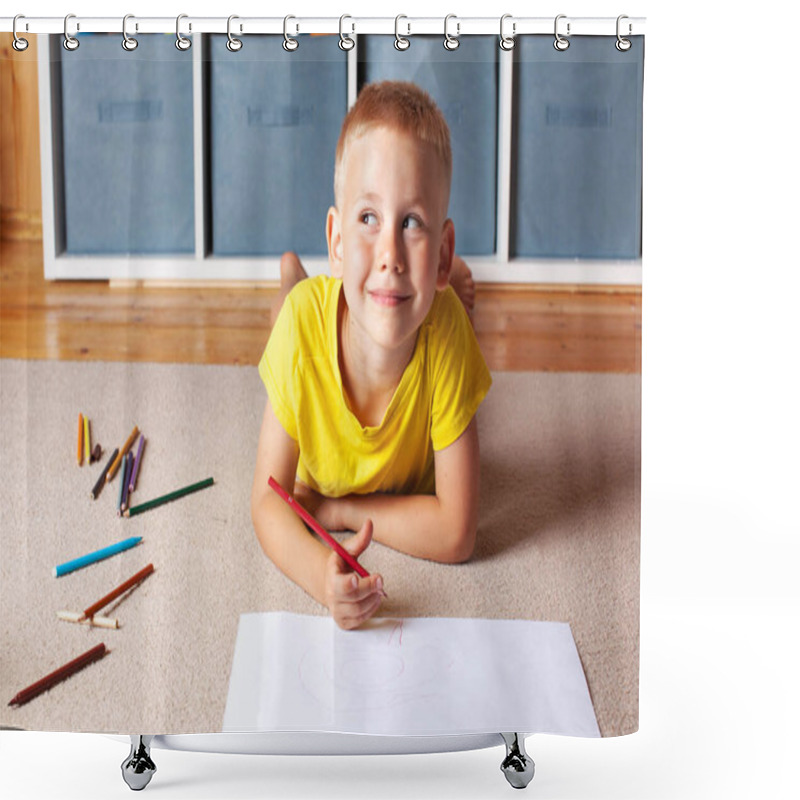 Personality  A Blond Boy In A Yellow T-shirt Lies On The Floor With A Drawing Sheet And Pencils And Smiles Thoughtfully. Unschooling. Shower Curtains