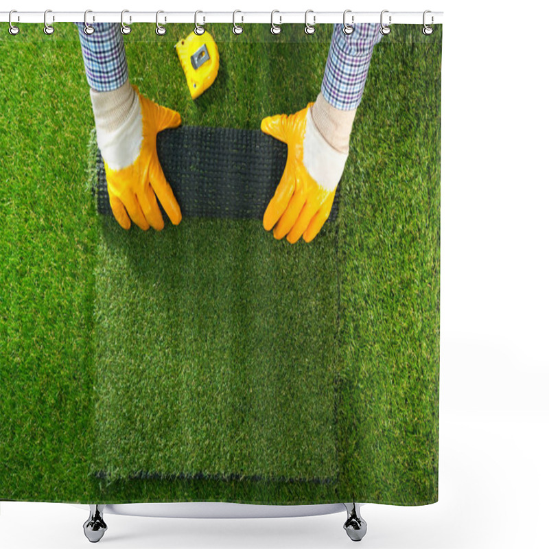 Personality  Men's Hands Hold A Roll Of Artificial Grass. Artificial Turf Background. Shower Curtains