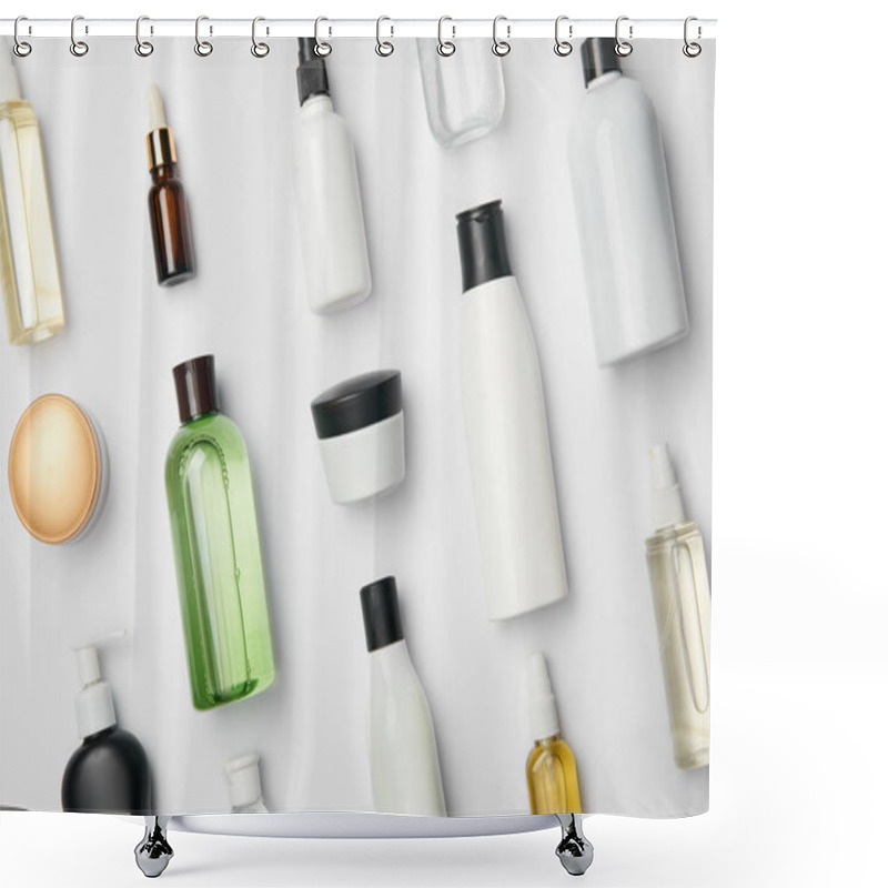 Personality  Top View Of Various Cosmetic Bottles And Containers On White Background Shower Curtains