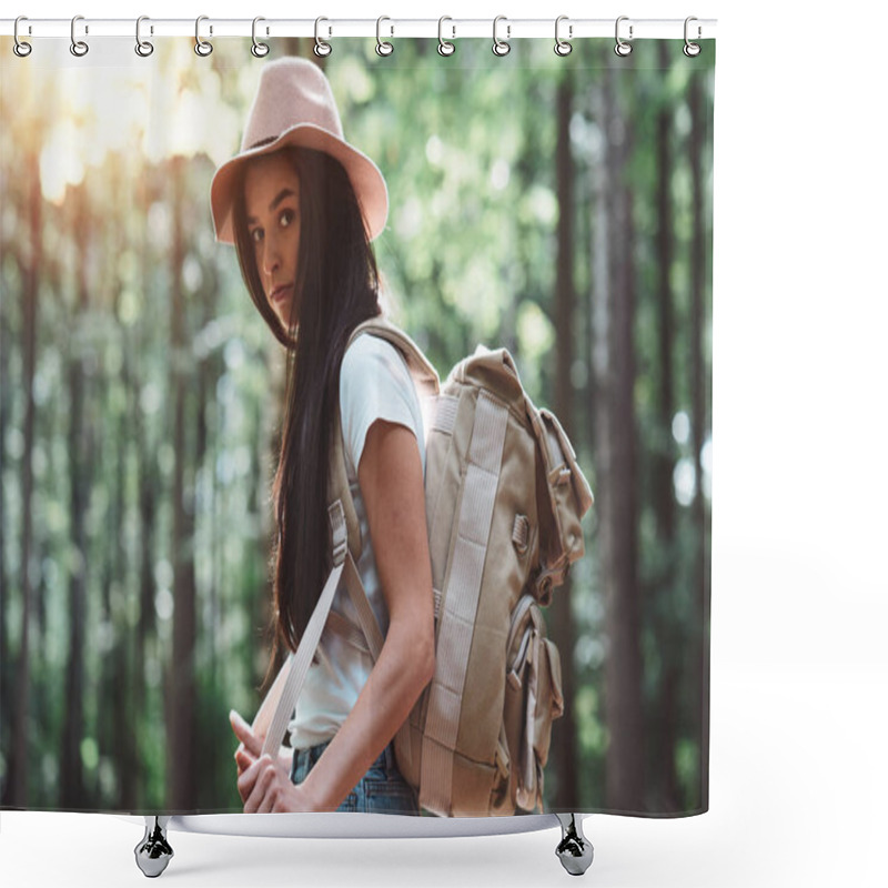 Personality  Handsome Traveler Woman With Backpack And Hat Standing In Forest. Young Hipster Girl Walking Among Trees On Sunset Shower Curtains