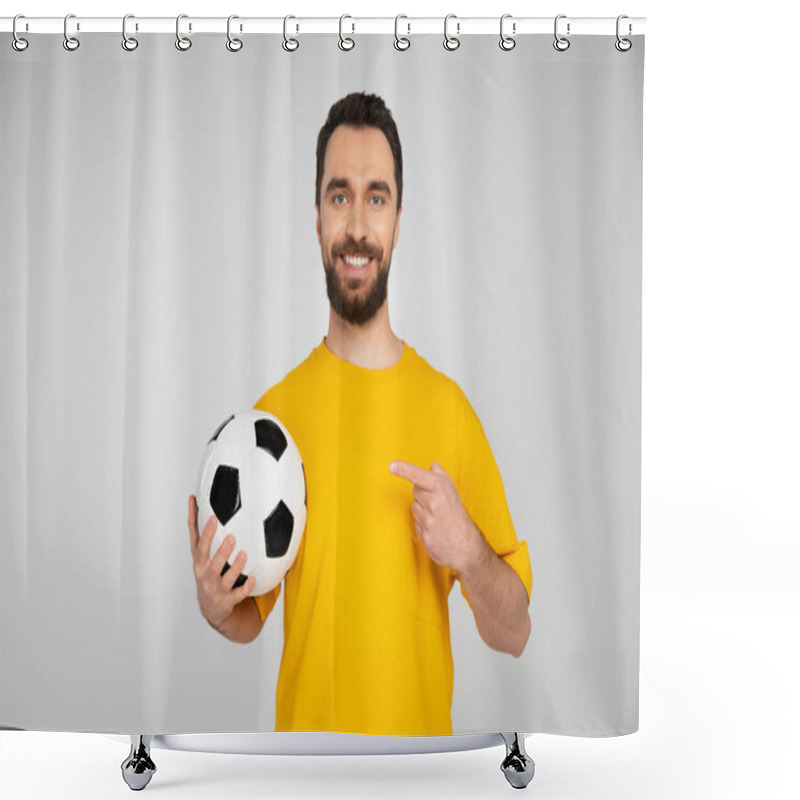 Personality  Joyful Football Fan In Yellow T-shirt Pointing At Soccer Ball Isolated On Grey Shower Curtains