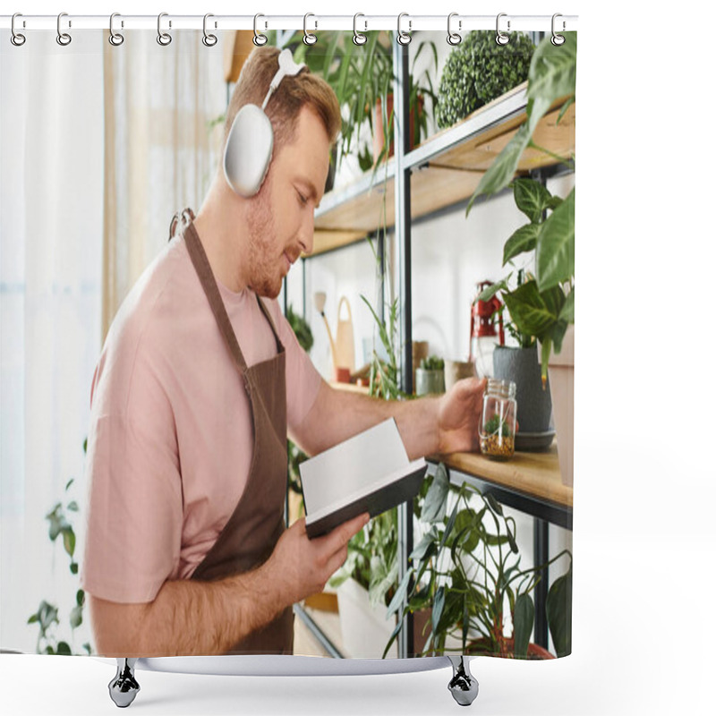 Personality  A Man Wearing Headphones Is Attentively Looking At A Notebook In A Plant Shop, Reflecting On The Beauty Of Nature. Shower Curtains