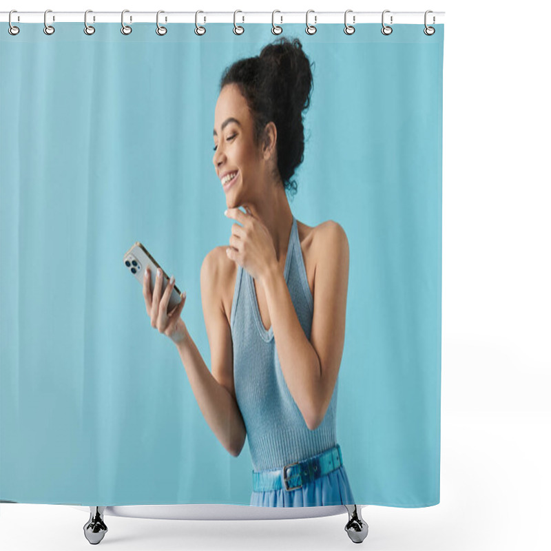 Personality  A Young African American Woman Wearing A Blue Dress Smiles As She Looks At Her Smartphone. Shower Curtains