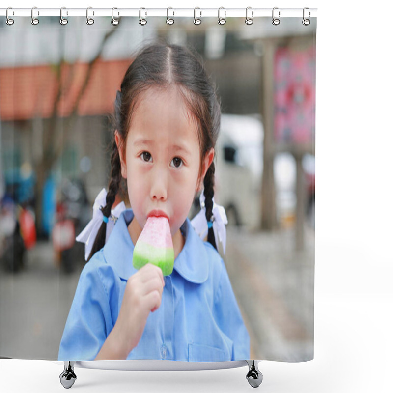 Personality  Adorable Little Asian Child Girl In School Uniform Sucking Or Eating Ice-cream In The Park Shower Curtains