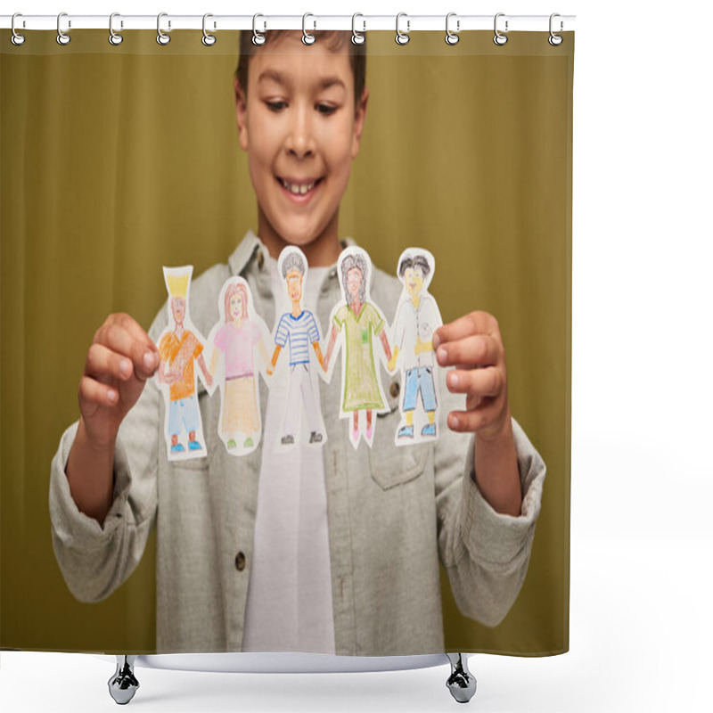 Personality  Blurred And Positive Multiracial Boy Holding Drawn Paper Characters During International Child Protection Day Celebration On Khaki Background Shower Curtains