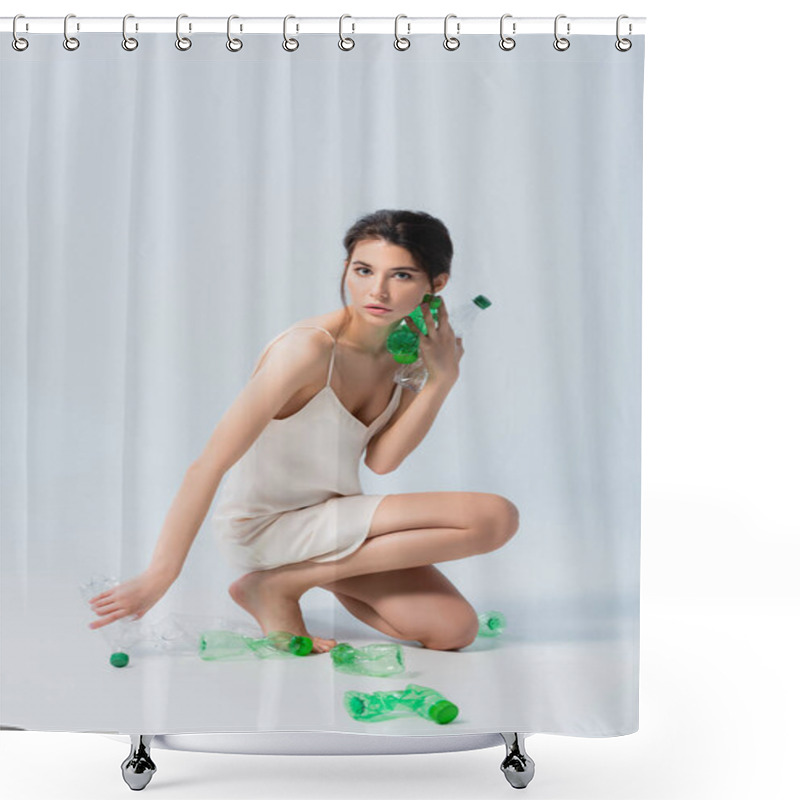 Personality  Brunette Woman In Silk Dress Holding Plastic Bottles And Looking At Camera On White, Ecology Concept  Shower Curtains