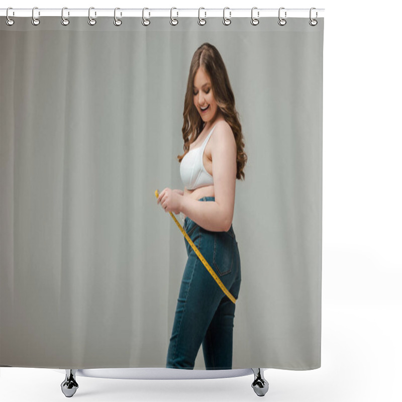 Personality  Cheerful Plus Size Woman In Jeans And Bra Measuring Body Isolated On Grey Shower Curtains