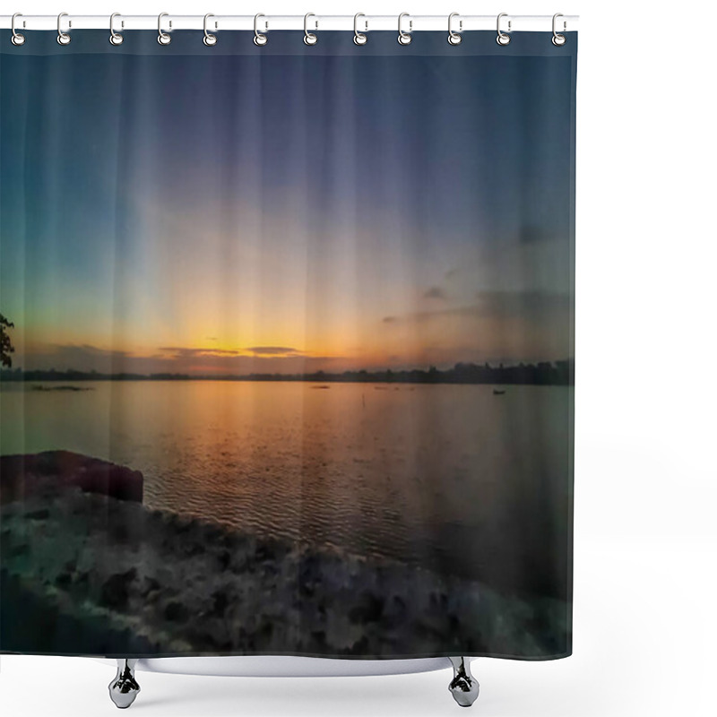 Personality  A Serene Sunset Over Calm Waters, With Subtle Waves And A Distant Shore, Evoking Tranquility And Natural Beauty. Shower Curtains