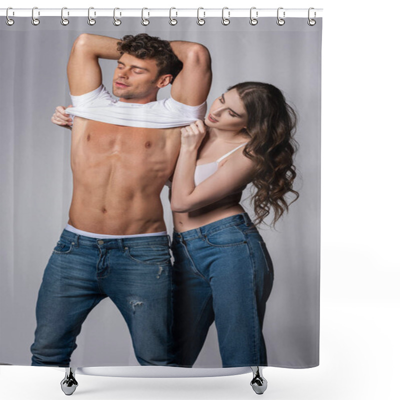 Personality  Attractive Woman In Bra Taking Off White T-shirt Of Muscular Boyfriend Isolated On Grey  Shower Curtains