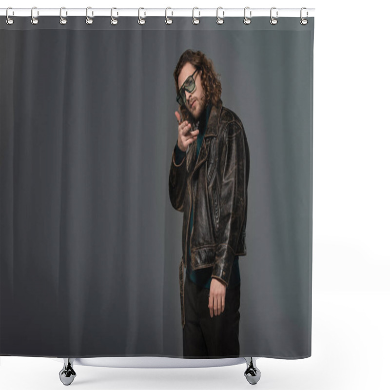 Personality  Handsome Man In Leather Jacket Looking At Camera And Showing Gun Gesture Isolated On Grey Shower Curtains