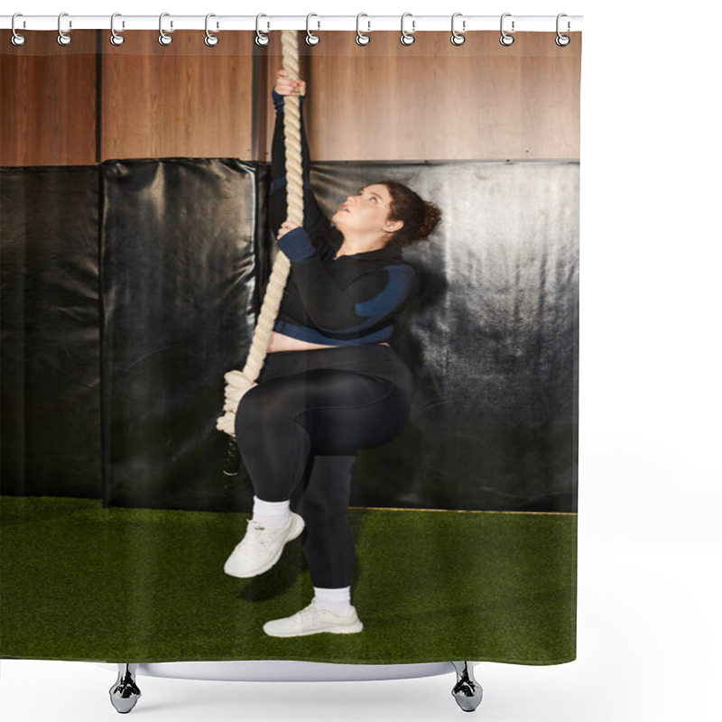 Personality  Woman Engages In A Focused Rope Climbing Exercise Within A Well Equipped Gym Shower Curtains