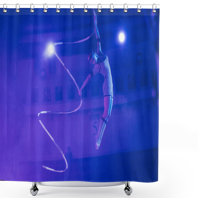 Personality  KYIV, UKRAINE - NOVEMBER 1, 2019: Air Gymnast Performing Exercise In Light Of Floodlights In Circus  Shower Curtains