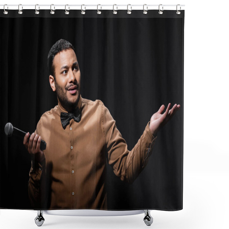 Personality  Confused Indian Comedian In Shirt And Bow Tie Holding Microphone And Showing Shrug Gesture During Monologue On Black  Shower Curtains