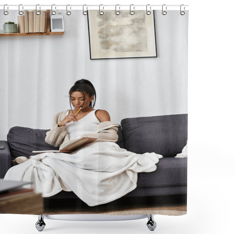 Personality  A Young Woman Thoughtfully Studies At Home, Wrapped In A Cozy Blanket While Writing Notes. Shower Curtains