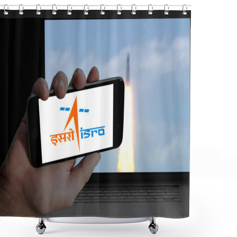 Personality   ISRO Logo In Holding Mobile And Chandrayaan 3 Launch Picture In Blurred Laptop Screen Background. Shower Curtains