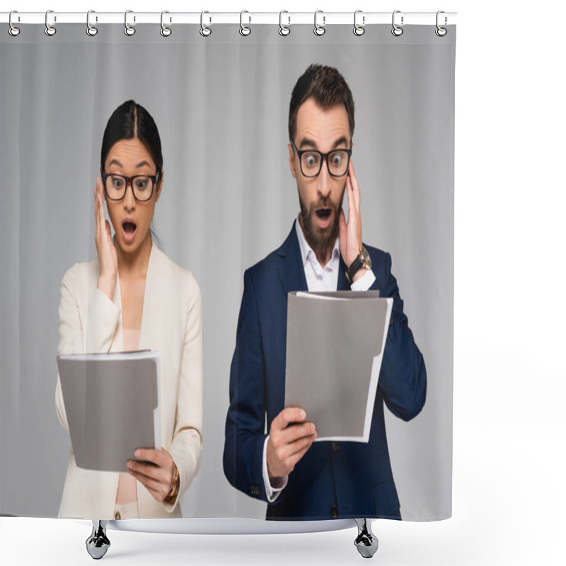 Personality  Shocked Interracial Business Partners In Eyeglasses Looking At Documents And Holding Hands Near Faces Isolated On Grey Shower Curtains