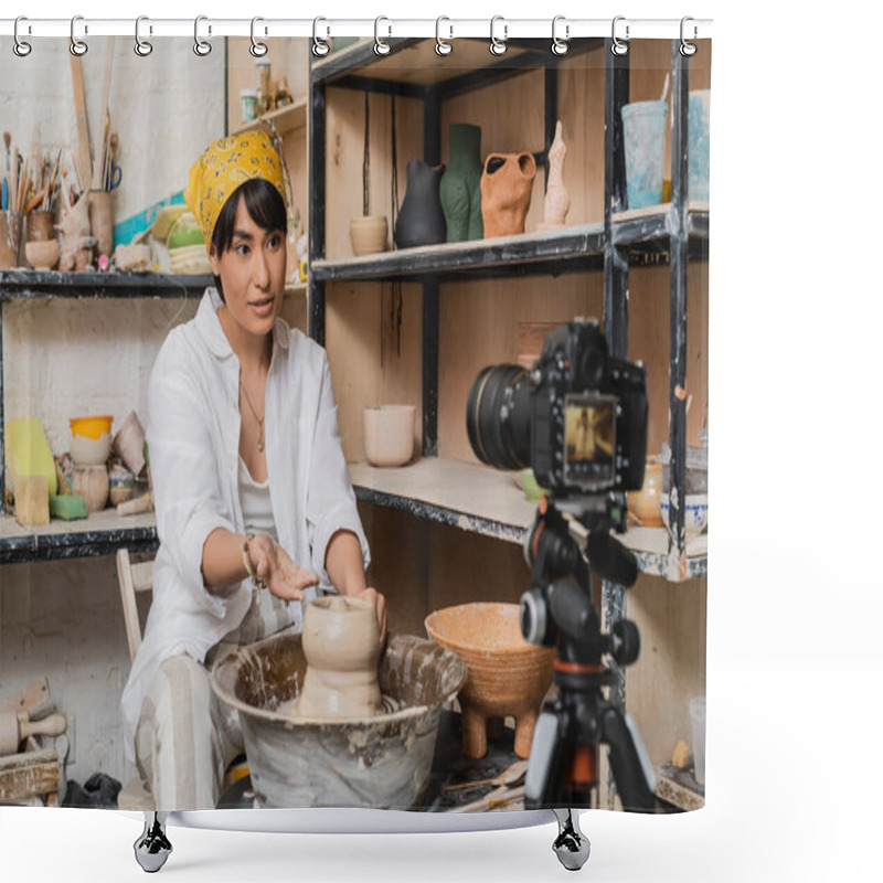 Personality  Asian Female Artisan In Workwear And Headscarf Talking And Gesturing At Digital Camera On Tripod While Working With Clay On Pottery Wheel In Art Workshop, Clay Sculpting Process Concept Shower Curtains