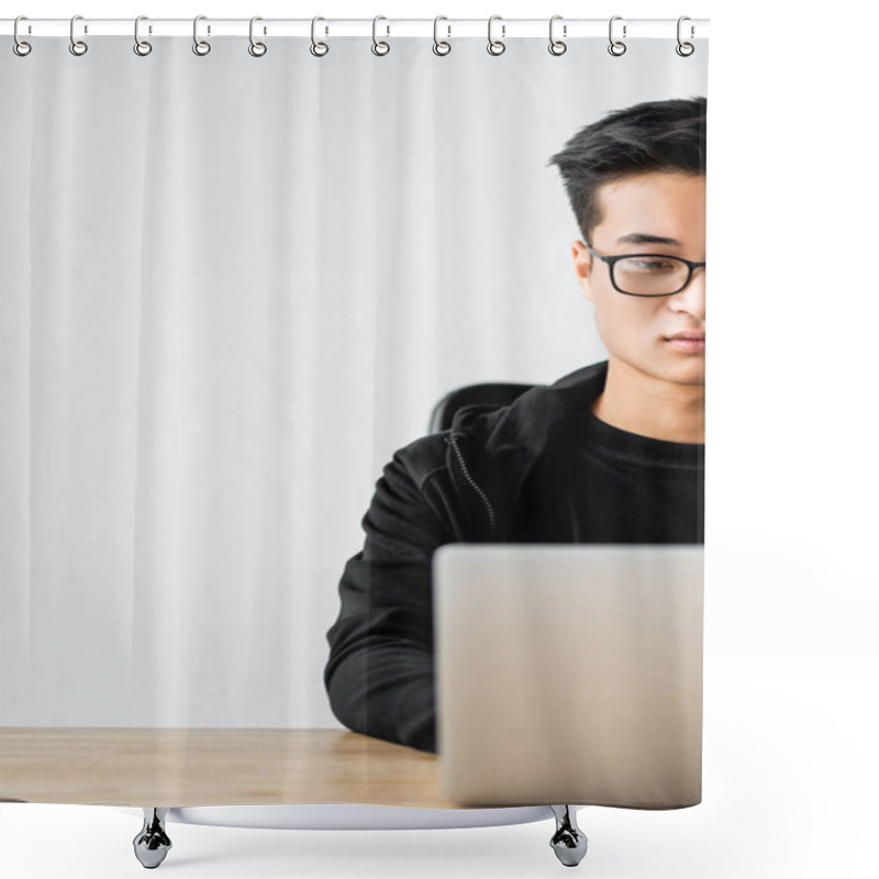 Personality  Cropped View Of Asian Hacker In Glasses Sitting At Table And Using Laptop  Shower Curtains