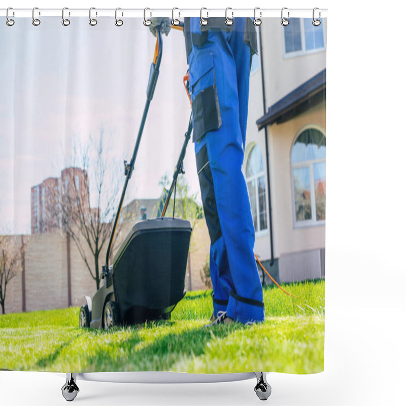 Personality  Young Man Mows The Lawn Using An Electric Lawn Mower In A Special Worker Suit Near A Large Country House In The Backyard Shower Curtains