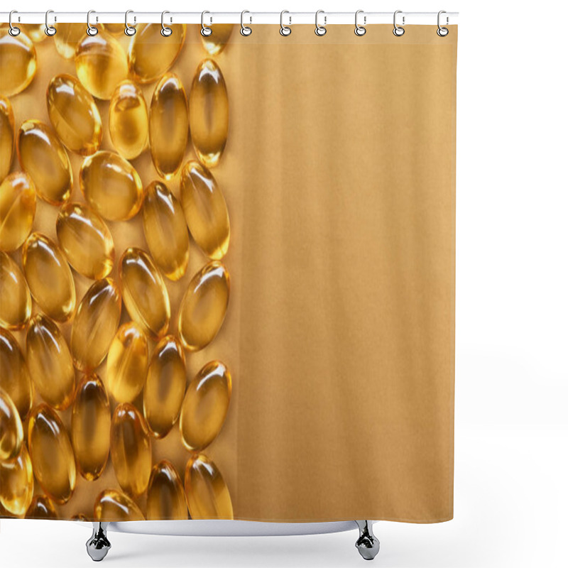 Personality  Top View Of Golden Shiny Fish Oil Capsules On Yellow Background With Copy Space Shower Curtains