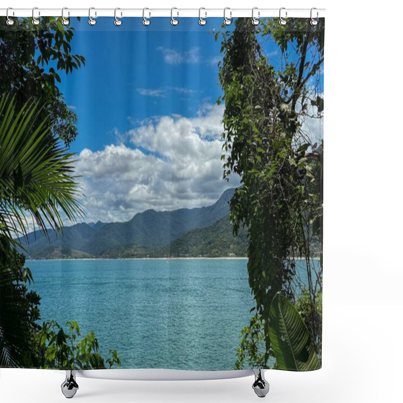 Personality  The Horizon Stretches Where The Blue Sky Meets The Serene Sea, While The Green Mountains Rise In The Background, Creating A Scene Of Peace And Grandeur. Shower Curtains