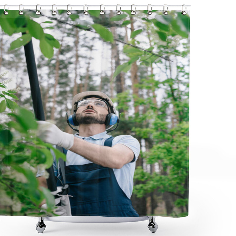 Personality  Selective Focus Of Gardener In Helmet, Protective Glasses And Hearing Protectors Trimming Trees With Telescopic Pole Saw In Garden Shower Curtains