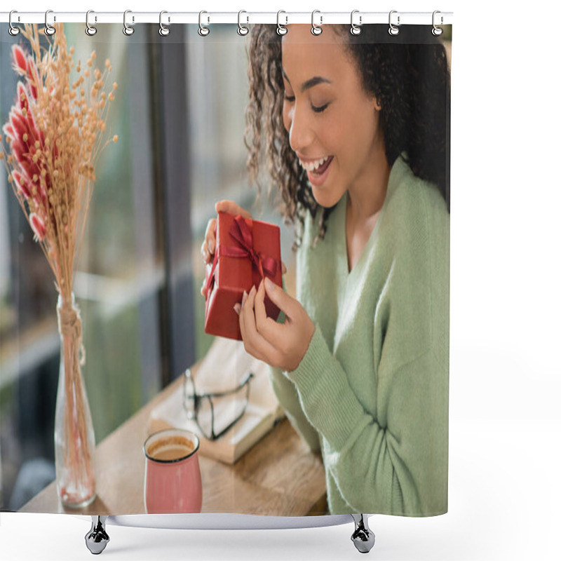 Personality  Happy African American Woman Pulling Ribbon On Wrapped Christmas Present In Cafe Shower Curtains