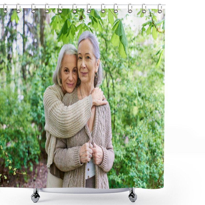 Personality  A Lesbian Couple In Cardigans Embraces In A Lush Forest Setting. Shower Curtains