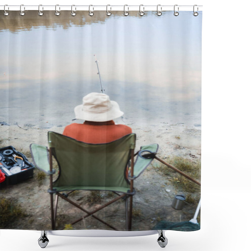 Personality  Back View Of Blurred Senior Man Fishing Near Walking Cane And Lake On Coast Shower Curtains