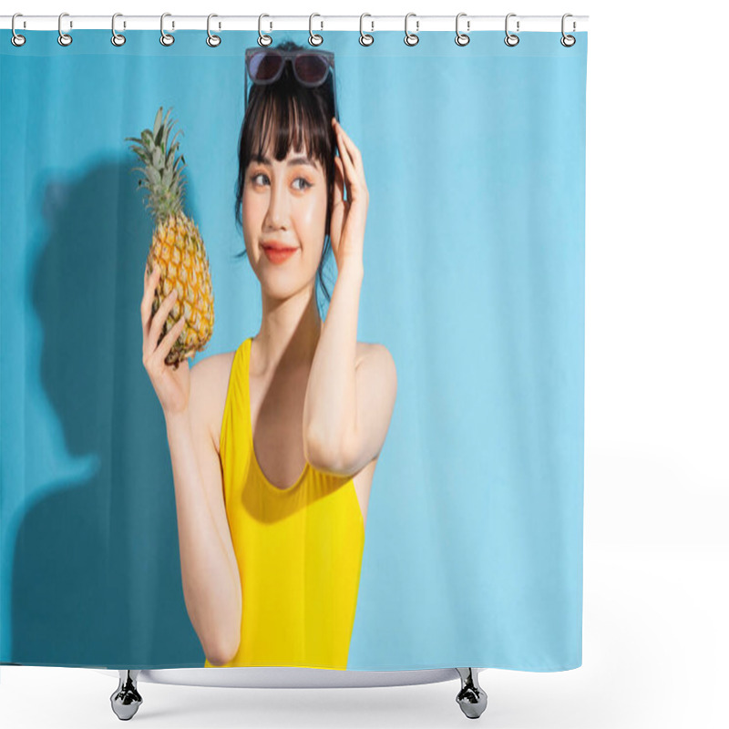 Personality  Beautiful Asian Woman Wearing Yellow Jumpsuit On Blue Background And Eating Tropical Fruits, Summer Concept Shower Curtains