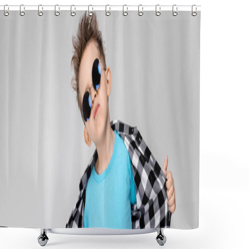 Personality  A Handsome Boy In A Plaid Shirt, Blue Shirt And Jeans Stands On A Gray Background. The Boy Is Wearing Round Glasses. The Boy Smiles And Pulls His Shirt Away Shower Curtains