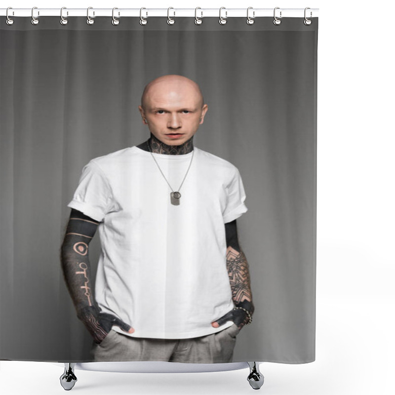 Personality  Handsome Bald Tattooed Man In White T-shirt Standing With Hands In Pockets And Looking At Camera Isolated On Grey Shower Curtains