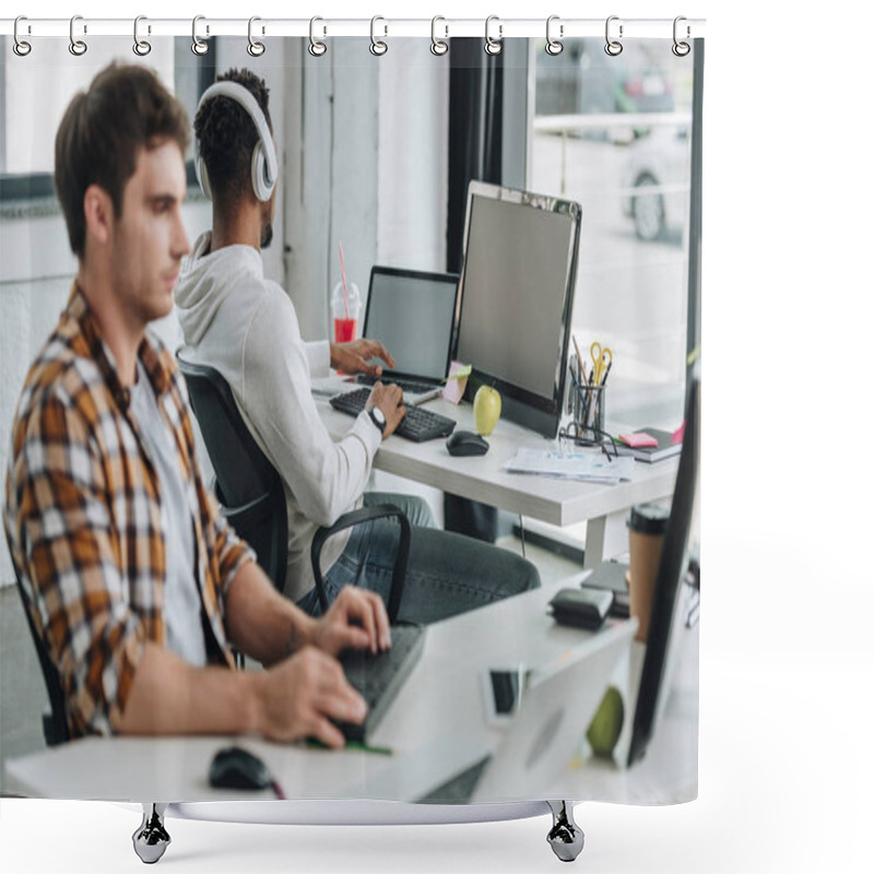 Personality  Selective Focus Of African American Programmer In Headphones Sitting At Workplace Near Colleague Shower Curtains