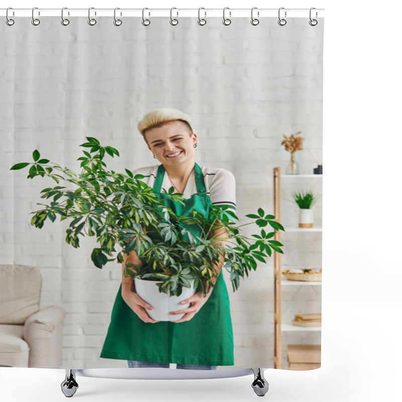 Personality  Stylish And Overjoyed Woman In Green Apron Standing In Modern Living Room With Natural Foliage Plant, Environmentally Friendly Habits, Sustainable Home Decor And Green Living Concept Shower Curtains