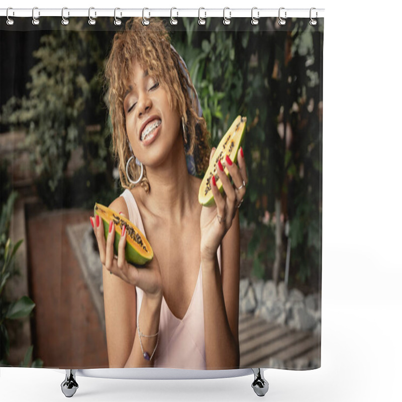 Personality  Smiling Young African American Woman With Braces Waring Summer Outfit And Closing Eyes While Holding Fresh Papaya In Blurred Indoor Garden, Fashion-forward Lady Inspired By Tropical Plants Shower Curtains