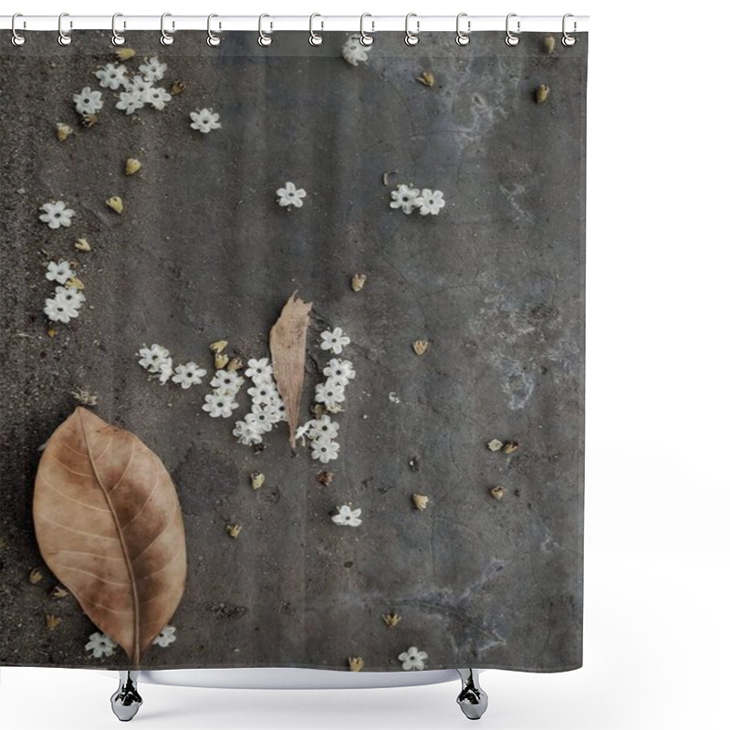 Personality  Small White Flowers Scattered On A Rough, Gray Surface, Accompanied By A Few Dried Leaves. The Contrast Between The Delicate Flowers And The Rugged Background Creates An Interesting Visual. Shower Curtains