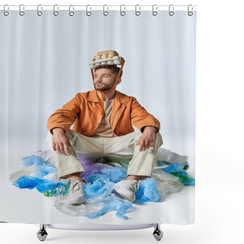 Personality  A Man Sits Amidst A Sea Of Plastic Bags, An Egg Carton Strapped To His Head Like A Crown. Shower Curtains