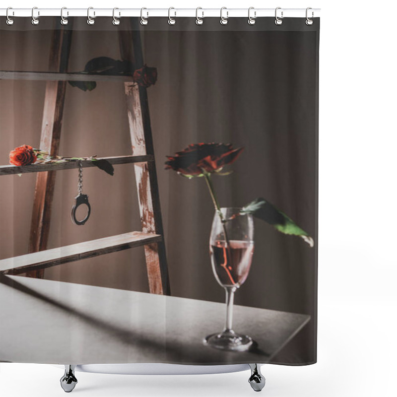 Personality  Red Rose Flower In Champagne Glass On Stone Table With Wooden Ladder And Metal Handcuffs On Background Shower Curtains