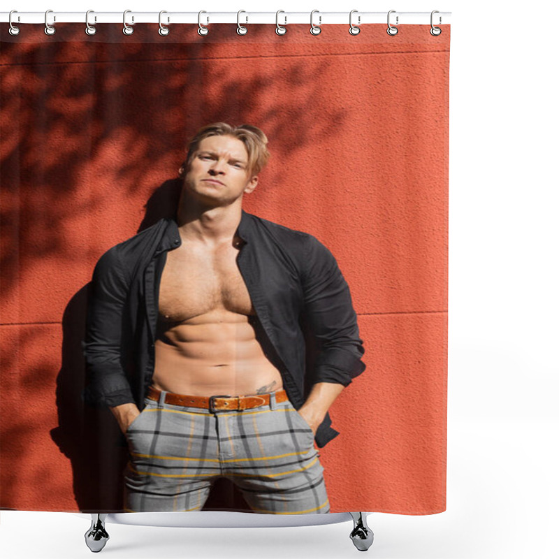 Personality  A Muscular Man With Blonde Hair Poses Against A Red Wall, Wearing A Black Shirt Unbuttoned To Reveal His Toned Physique. Shower Curtains