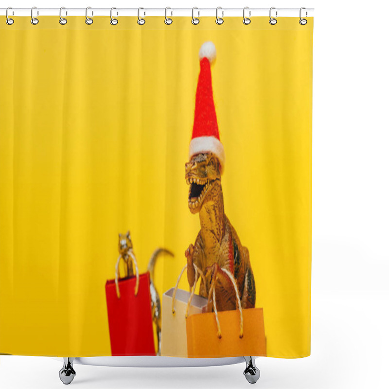 Personality  Selective Focus Of Toy Dinosaurs In Santa Hat And Shopping Bags On Yellow Background Shower Curtains