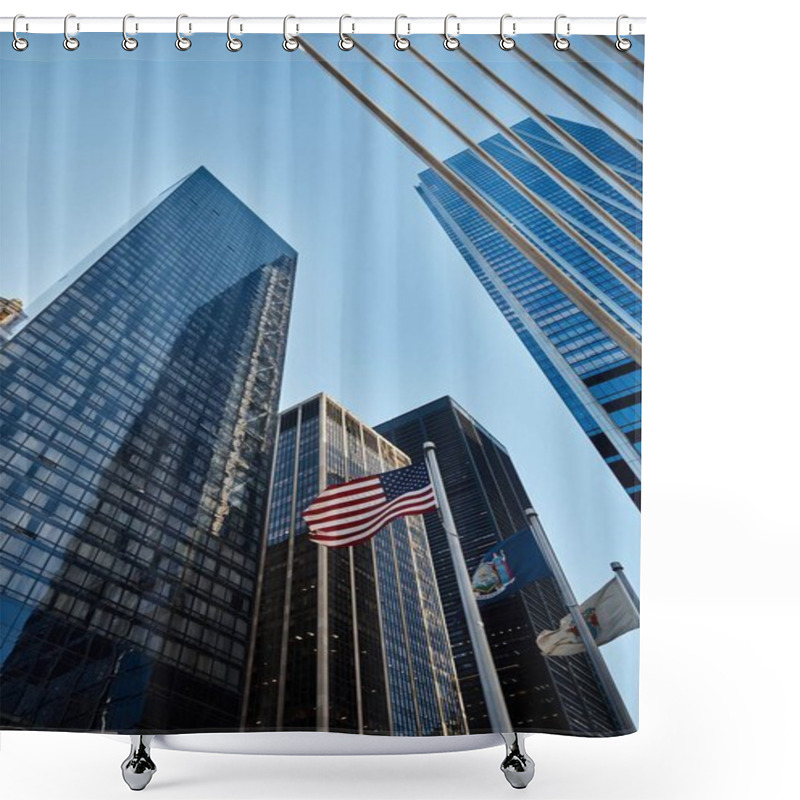 Personality  A Low Angle Shot Of Skyscrapers In New York City With The American Flag Waving In The Breeze. Shower Curtains