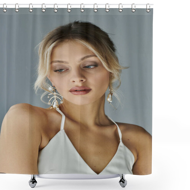 Personality  A Captivating Young Woman With Blonde Hair Dons A White Top And Earrings, Exuding Elegance And Beauty Against A Grey Backdrop. Shower Curtains