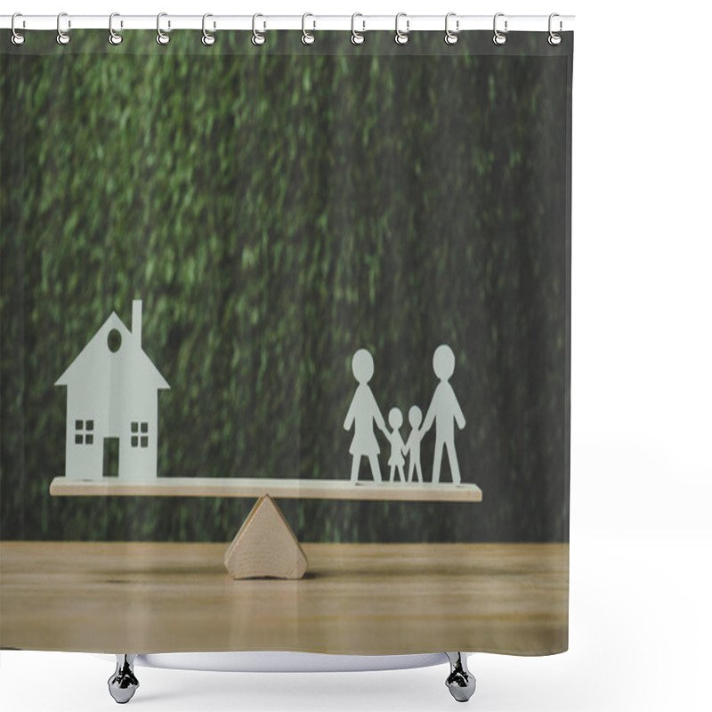 Personality  Paper Cut House And Paper Family Balancing On Seesaw On Green Background Shower Curtains